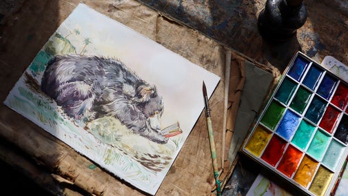 A watercolour illustration of a brown bear